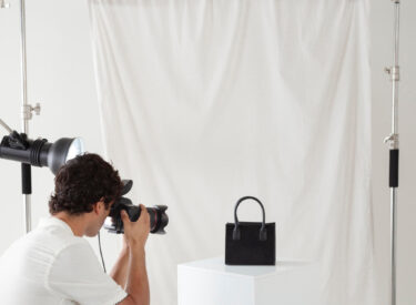 young-man-working-his-photography-studio